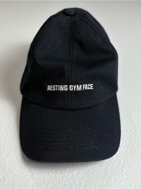 Under Armour Black Baseball Cap with White "RESTING GYM FACE" Embroidery